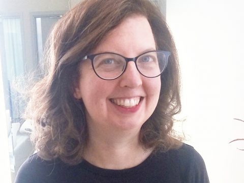 headshot of Tracey S. Rosenberg looking into the lense