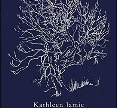 a blue paperback book with a silver tree on the cover
