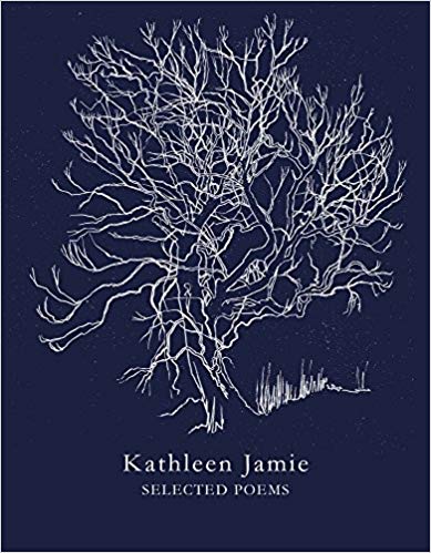 a blue paperback book with a silver tree on the cover